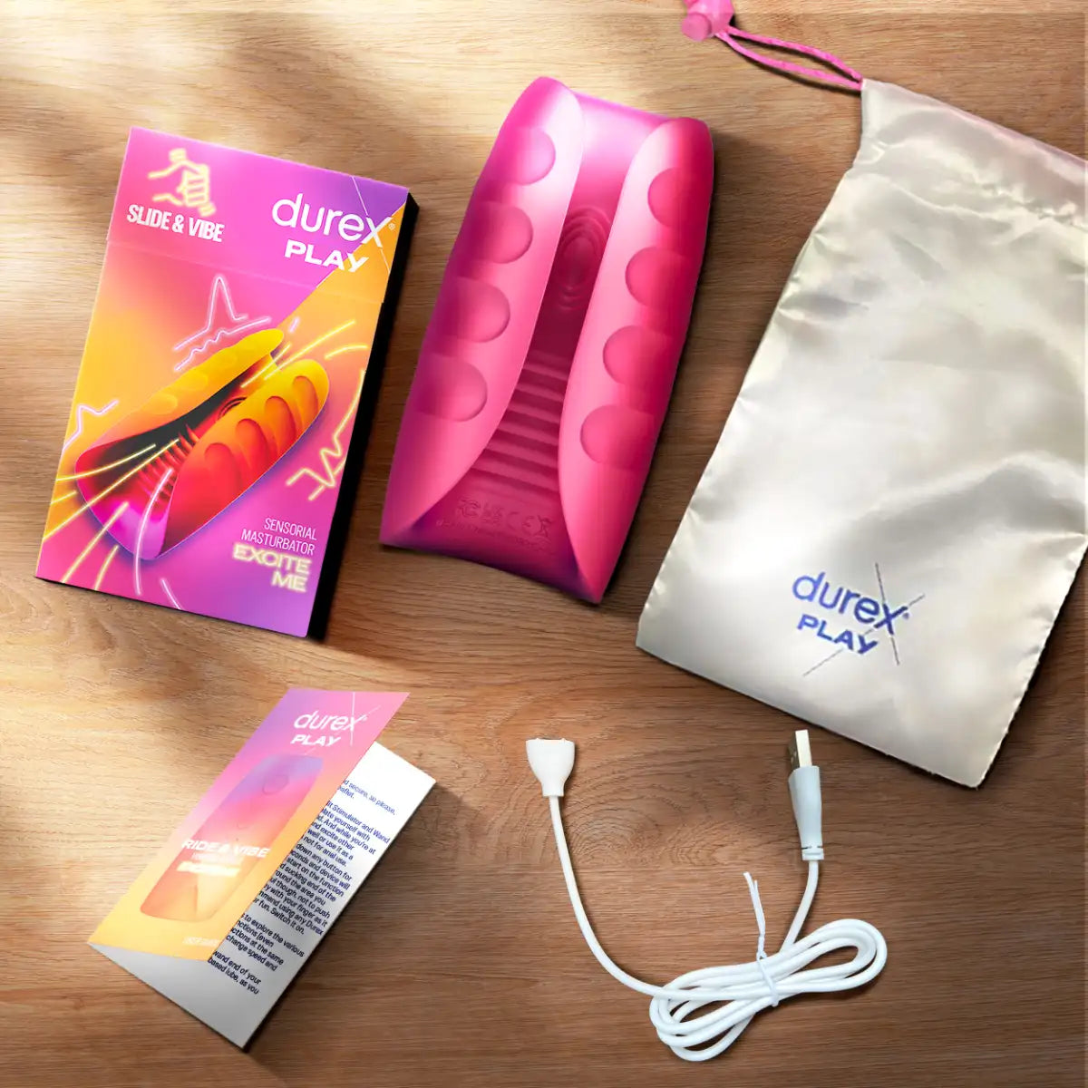 Durex Play Slide & Vibe värähtelevä masturbaattorin pakkaus sisältää latauskaapelin ja matkapussin
