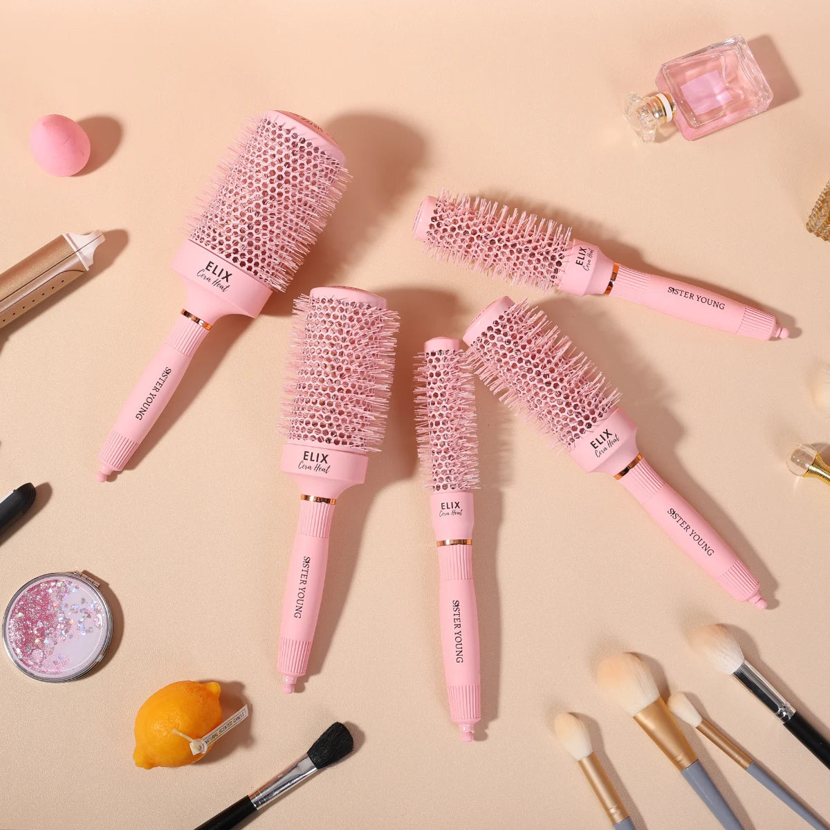 SisterYoung Elix Cera Heat Pink keraamisten hiusharjojen sarjaan kuuluu viittä eri kokoa harjoja