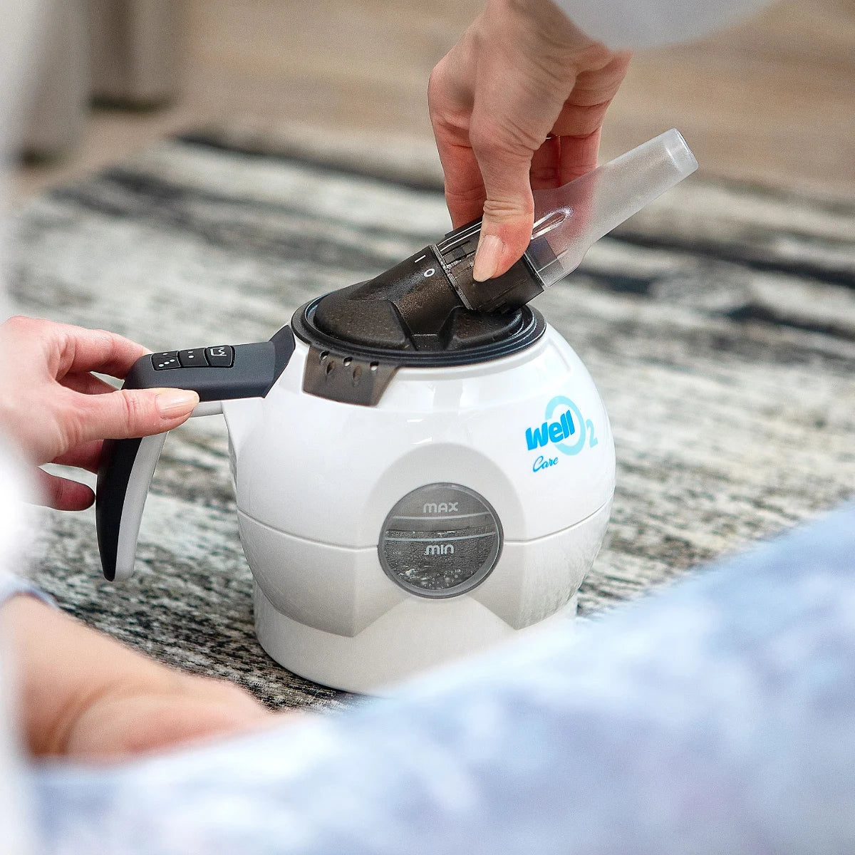 WELLO2 suukappale kiinnitetään hengitysharjoituslaitteeseen